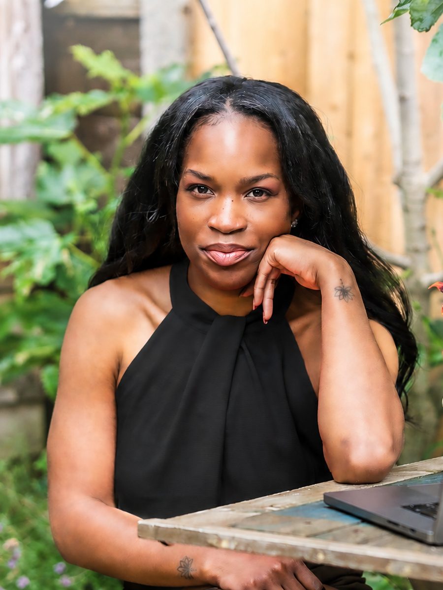 Onye Iweha, founder of Your Mind Story, sitting at a garden table